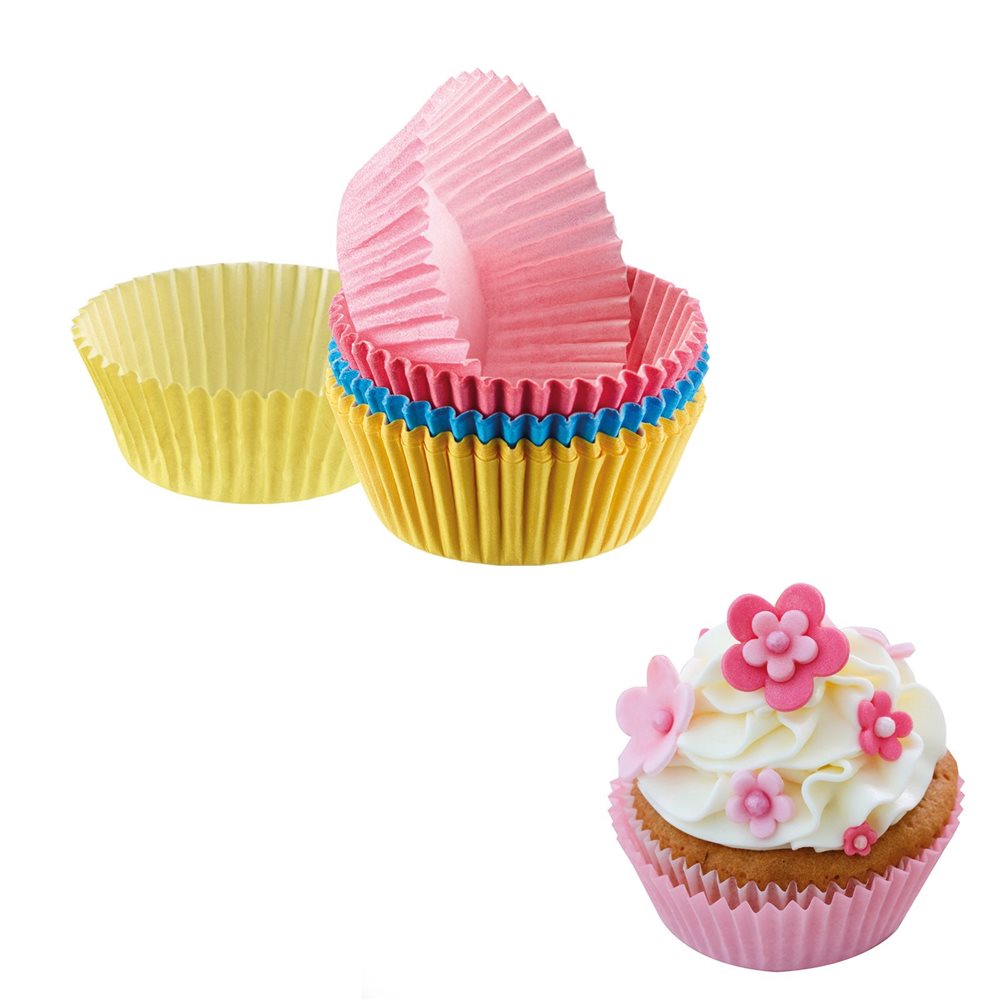 Caissettes à cupcakes et décoration de gâteau rose à pois
